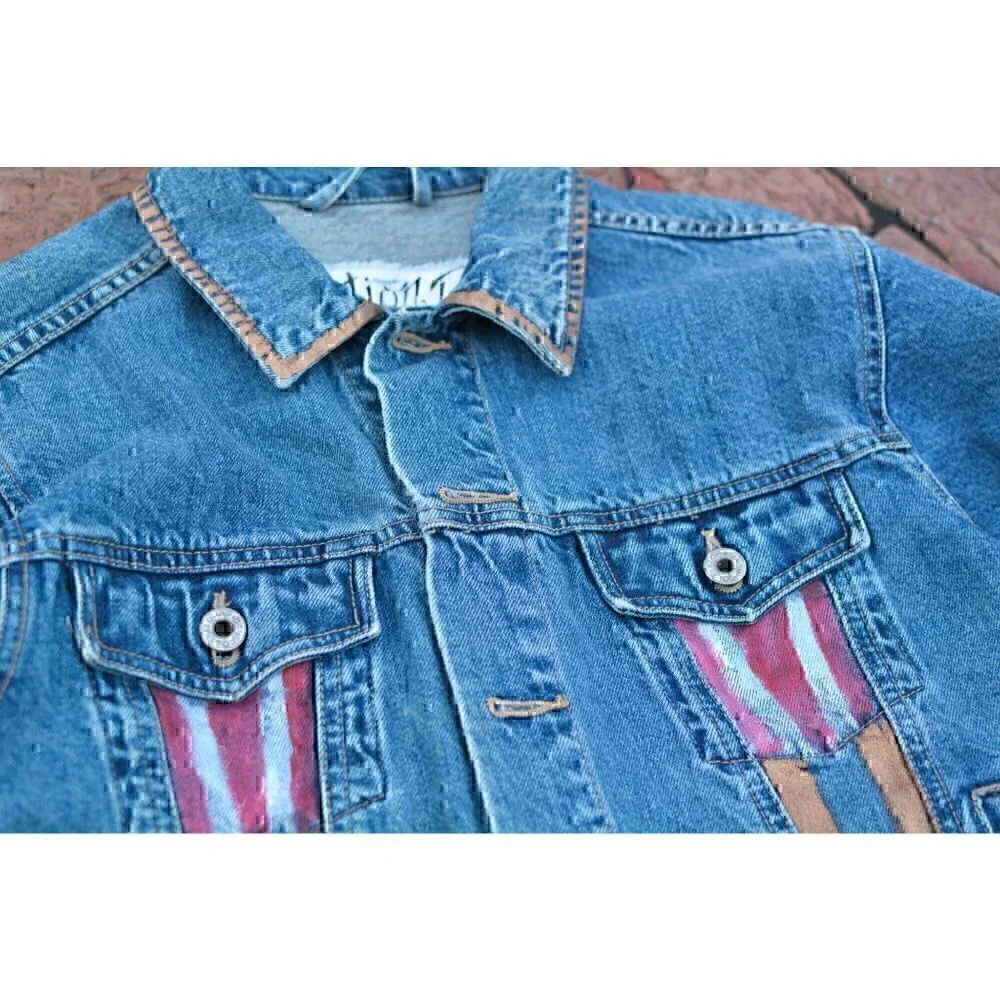 Vintage faded denim classic jean jacket. Retro cut with hand painted images